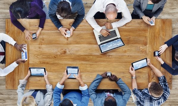 Group Of Business People Using Digital Devices